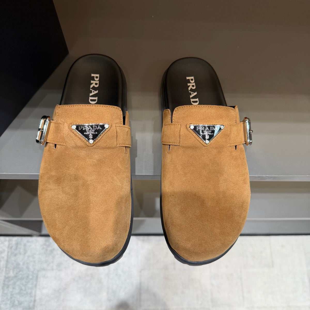 PRADA Men’s Camel Slip-On Mules | Triangle Logo & Metal Buckle Detail
