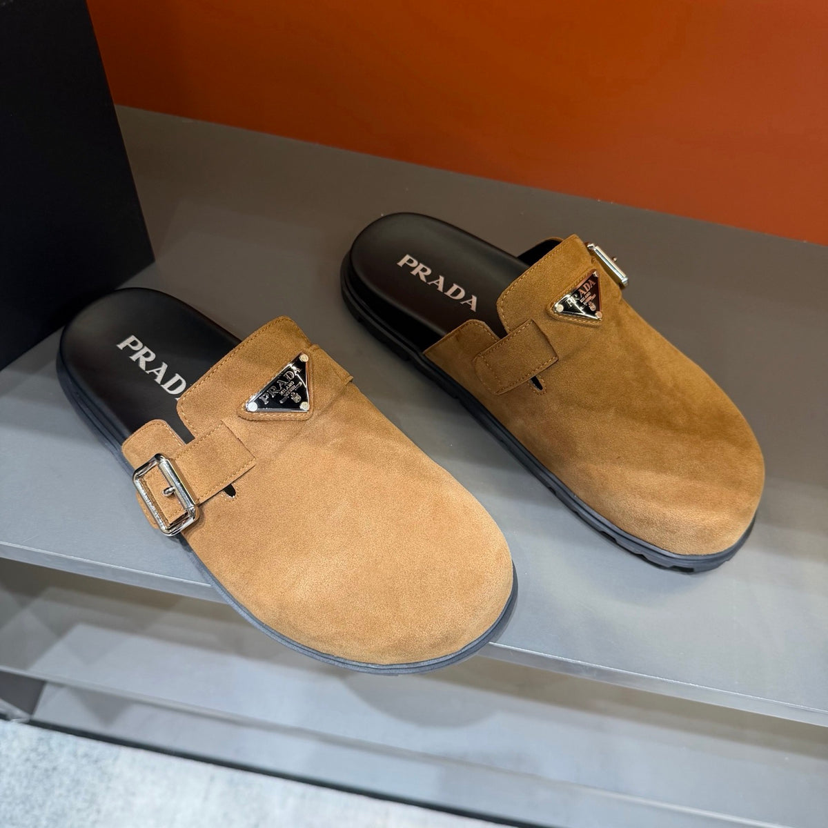 PRADA Men’s Camel Slip-On Mules | Triangle Logo & Metal Buckle Detail