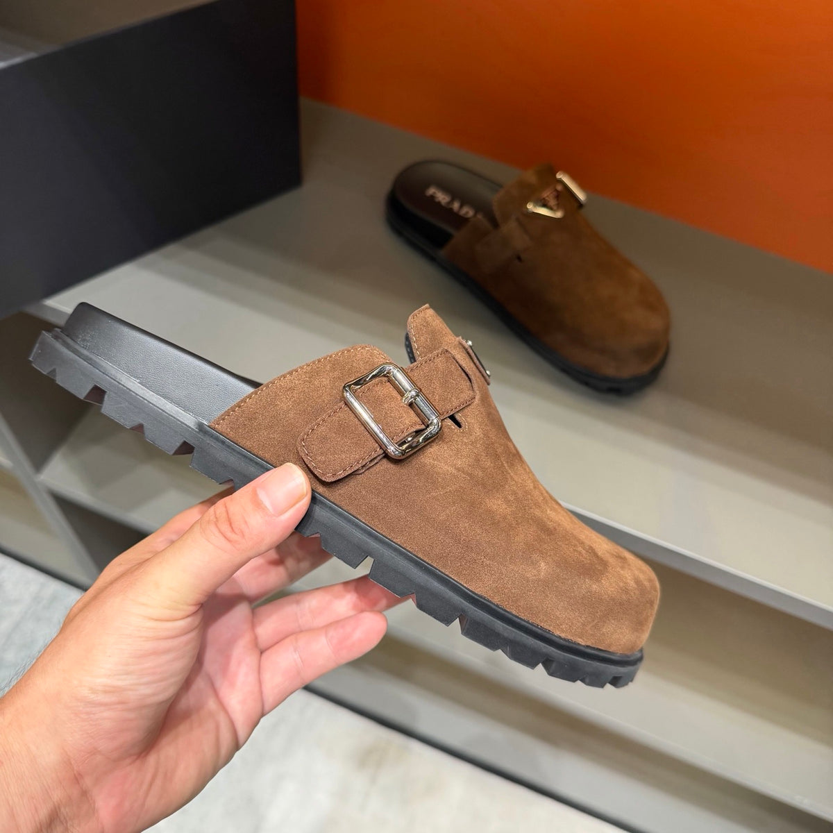 PRADA Men’s Warm Brown Mules | Triangle Logo & Metal Buckle Detail